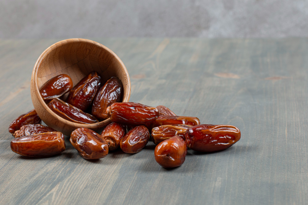 sweet-dates-out-wooden-bowl-marble-surface